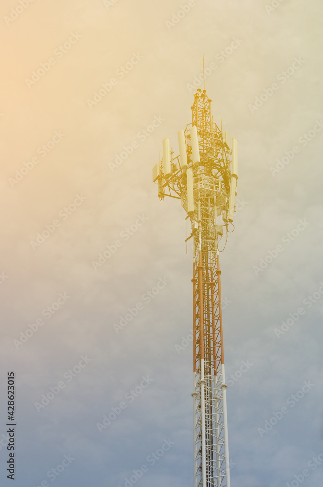 Telecommunication tower with antenna and blue sky