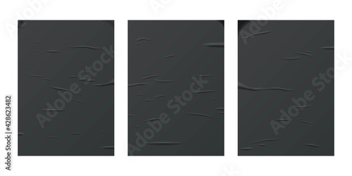 Glued black paper sheet set isolated on white background. Vector realistic crumpled posters bundle. Wet greased wrinkles blank template texture. Empty advertising column mockup for creative design.