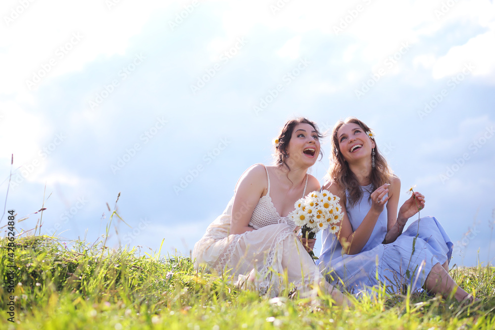 Beautiful girls on a summer day walking Beautiful girls on a summer day walking