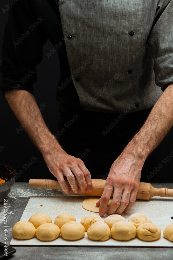 baker kneading dough
