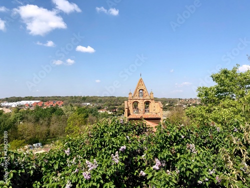 church of cornebarrieu behind the trees 