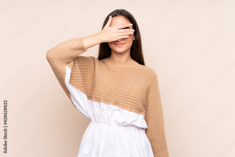 Young caucasian woman isolated on beige background covering eyes by hands. Do not want to see something Young caucasian woman isolated on beige background covering eyes by hands. Do not want to see something