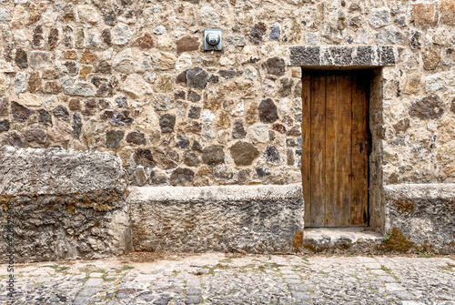 Wooden Door And Stone Wall - Antigua - Guatemala © adfoto