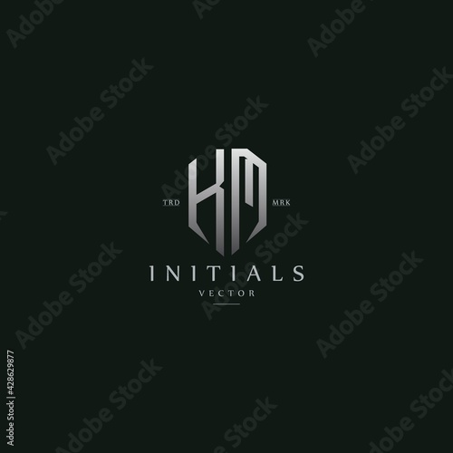 classy KM vintage metal monogram logo. elegant silver initials icon premium vector design template