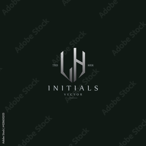 classy LH vintage metal monogram logo. elegant silver initials icon premium vector design template