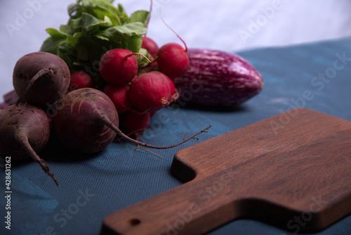 Red vegetables and wood.