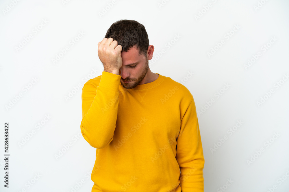 Young Brazilian man isolated on white background with headache Young Brazilian man isolated on white background with headache