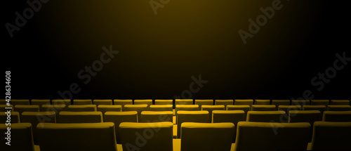 Cinema movie theatre with yellow seats rows and a black background. Horizontal banner