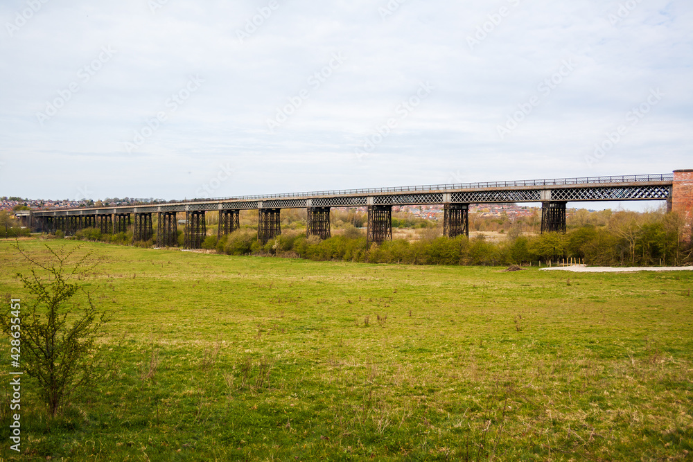 Ilkeston, UK, April,18,2021: The Bennerley Viaduct  near Ilkeston  Derbyshire. This grade 2 listed disused railway viaduct built in 1877 of iron construction across the Erewash Valley
