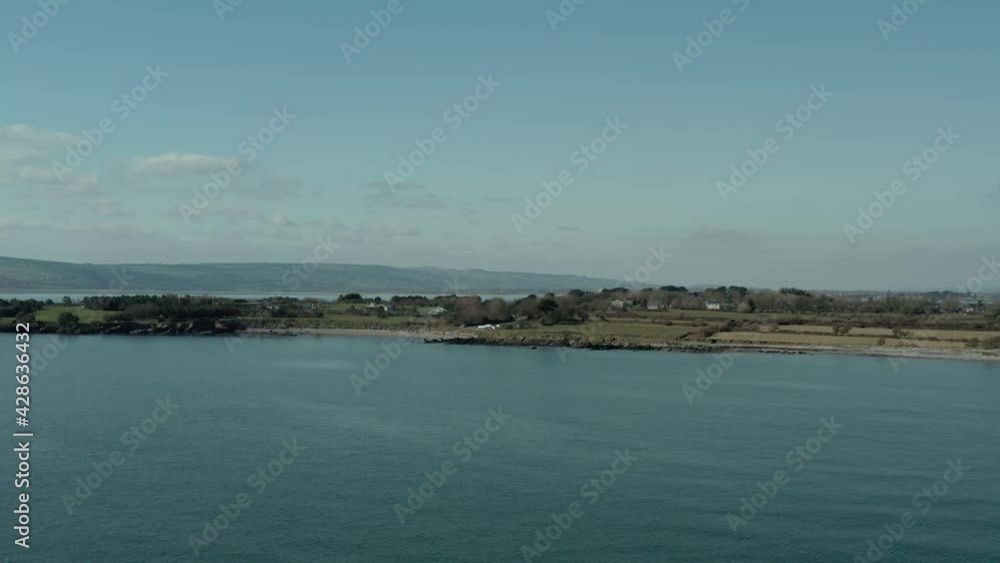 Beautiful aerial wide angle establishing shot of seacoast at day Beautiful aerial wide angle establishing shot of seacoast at day