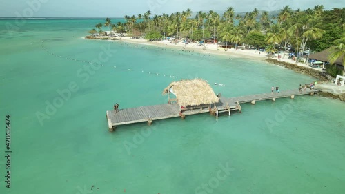 Descending aerial of Pigeon Point Heritage Park on the Caribbean island of Tobago photo