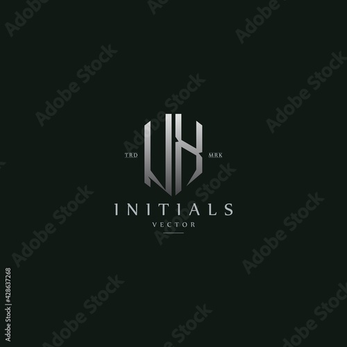 classy UX vintage metal monogram logo. elegant silver initials icon premium vector design template