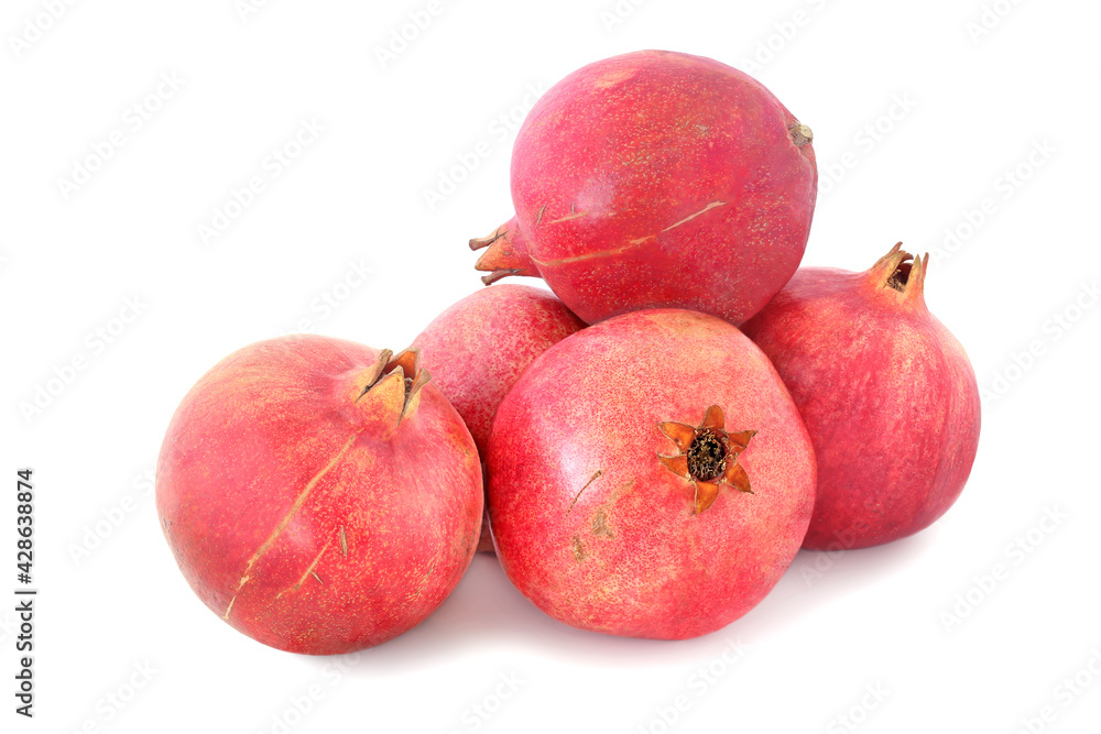 Several ripe pomegranates with isolated on white Several ripe pomegranates with isolated on white
