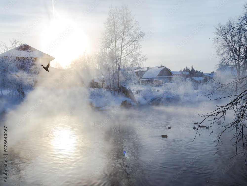 morning winter frosty landscape with fog and forest on the river bank, Russia, Ural, January morning winter frosty landscape with fog and forest on the river bank, Russia, Ural, January