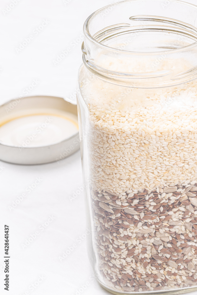 Healthy bowl with sesame sunflower flax seeds and copy space Healthy bowl with sesame sunflower flax seeds and copy space