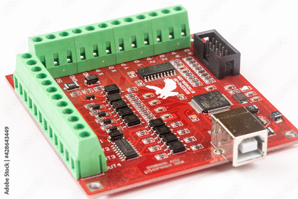 CNC motherboard isolated above white background CNC motherboard isolated above white background