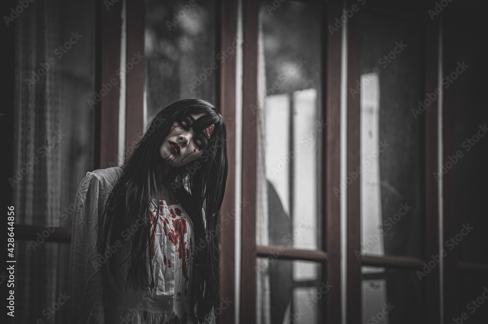 Portrait of asian woman make up ghost,Scary horror scene for background,Halloween festival concept,Ghost movies poster Portrait of asian woman make up ghost,Scary horror scene for background,Halloween festival concept,Ghost movies poster