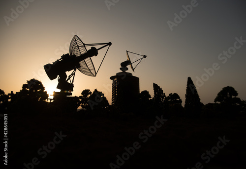 Obraz na płótnie Space radar antenna on sunset
