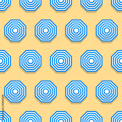 Summer seamless pattern with parasols from above, on beach sand.