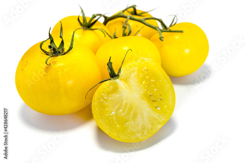 yellow tomatoes isolated on white background