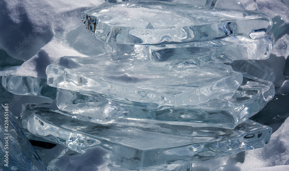 Scenic winter lake Baikal landscape with huge pressure ridge transparent ice blocks on the surface Scenic winter lake Baikal landscape with huge pressure ridge transparent ice blocks on the surface