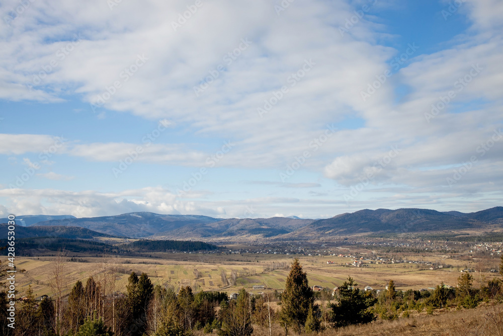 Mountain green valley village landscape. Mountain valley town panorama
