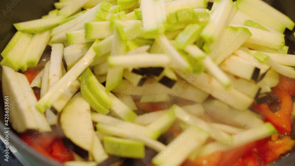 Cooking vegetables in a pan. Steaming vegetables, healthy eating, vegetarian cuisine. Delicious taste, homemade dish. Cooking vegetables in a pan. Steaming vegetables, healthy eating, vegetarian cuisine. Delicious taste, homemade dish.