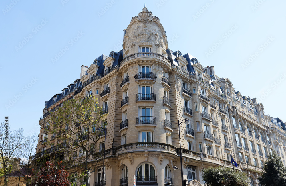 Fototapeta premium Traditional French house with typical balconies and windows. Paris.
