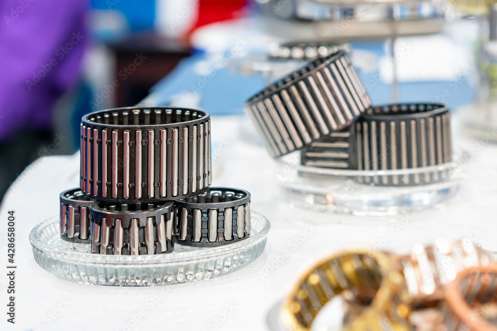 various size material component parts of series bearing cam or sprag one way clutch for automotive or machine industrial on table various size material component parts of series bearing cam or sprag one way clutch for automotive or machine industrial on table