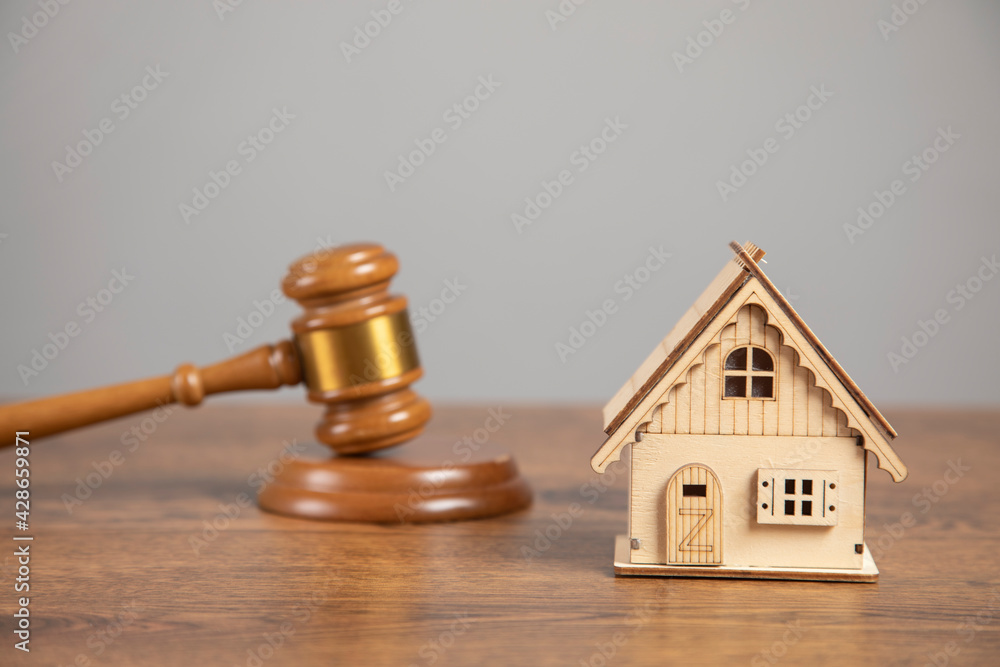law judge gavel with house model law judge gavel with house model