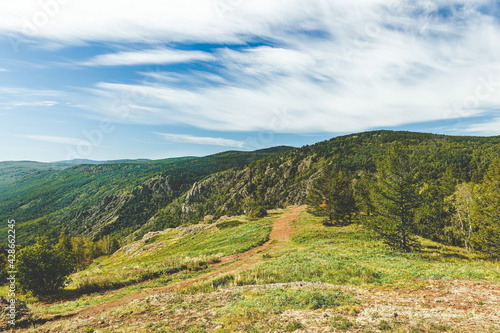 evergreen fir forest on a hilltop among the mountains of the National Park of the Republic of Bashkortostan on Lake Bannoye photo