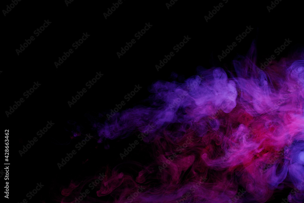 Art photo of purple smoke moves on black background. Beautiful swirling colorful smoke. Art photo of purple smoke moves on black background. Beautiful swirling colorful smoke.