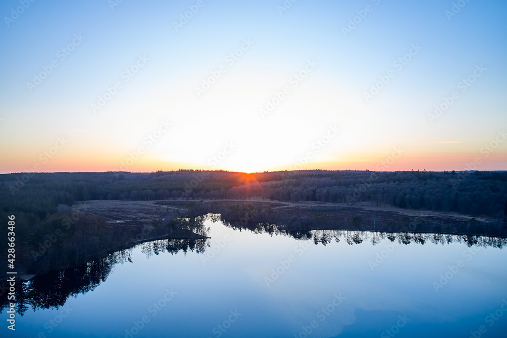 Fototapeta premium View of blue lake Sunset