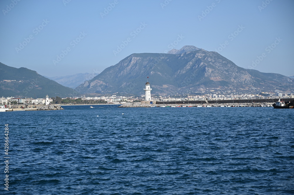 seaport in spring with mountains in the background