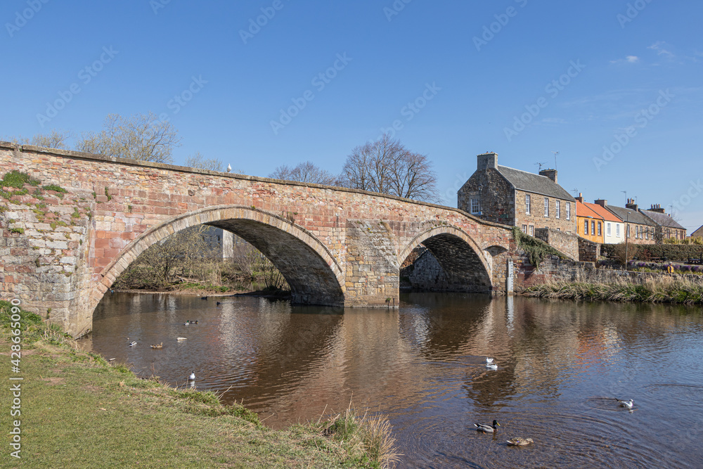 River Tyne and old Nungate Bridge in Haddington, One of Scotland’s oldest bridges, the bridge dates from the 16th century, Scotland.