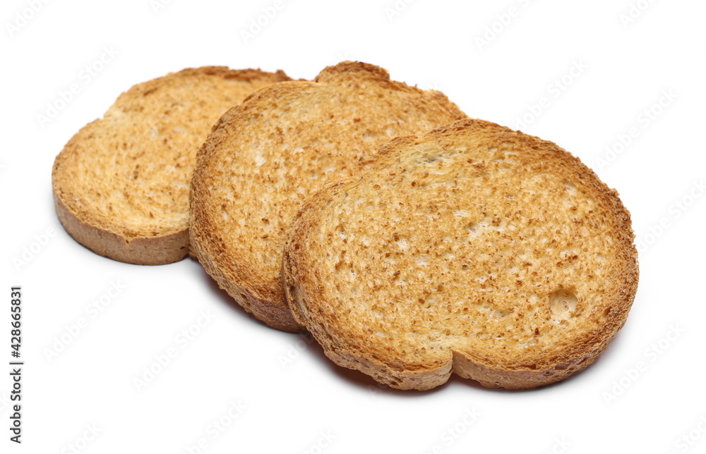 Pile rusks with wholewheat flour, sliced whole wheat dry rusk bread isolated on white background Pile rusks with wholewheat flour, sliced whole wheat dry rusk bread isolated on white background