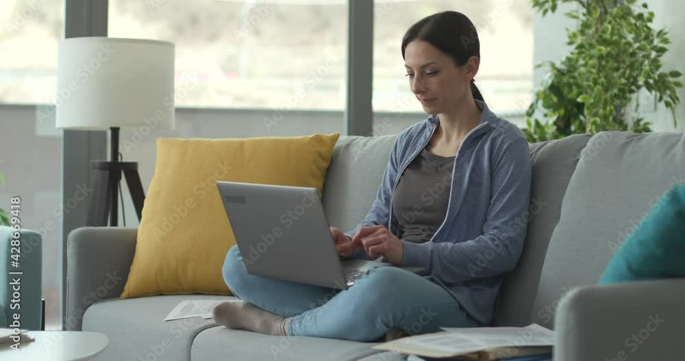 Woman working from home and taking a break Woman working from home and taking a break