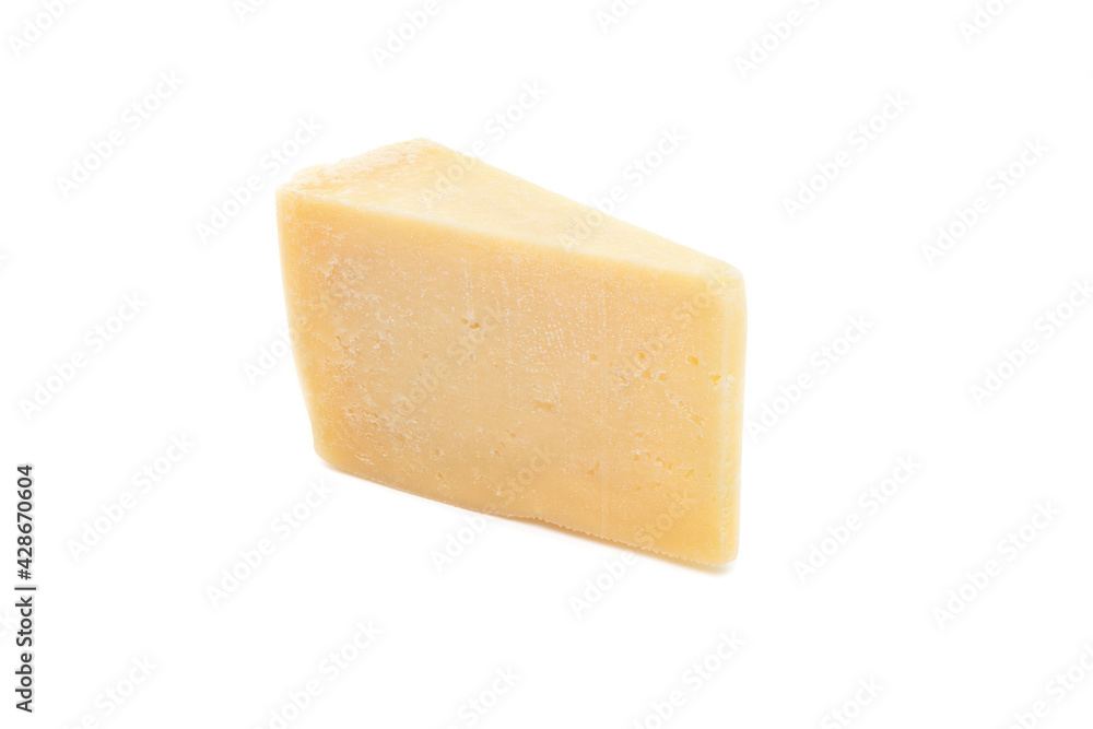 Piece of parmesan cheese isolated on white background. Block of Italian hard cheese close up view.