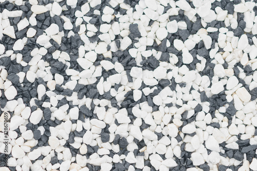 Fine crushed stone of white and black color