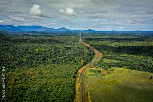 aerial image with drone of the highway in Roraima Brazil in the middle of the Forest photo