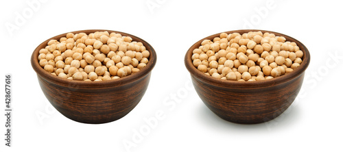 chickpea in clay bowl on white background, isolated and with shadow