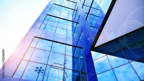 Downtown corporate business district architecture. Glass reflective office buildings against blue sky and sun light. Rising sun on the horizon. Velvia graphic filter.