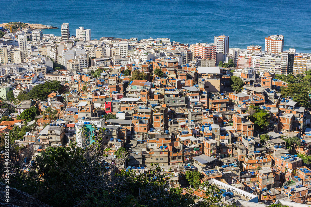 morro do cantagalo with the ipanema district and arpoador beach in the background.