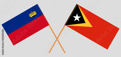 Crossed flags of Liechtenstein and East Timor. Official colors. Correct proportion