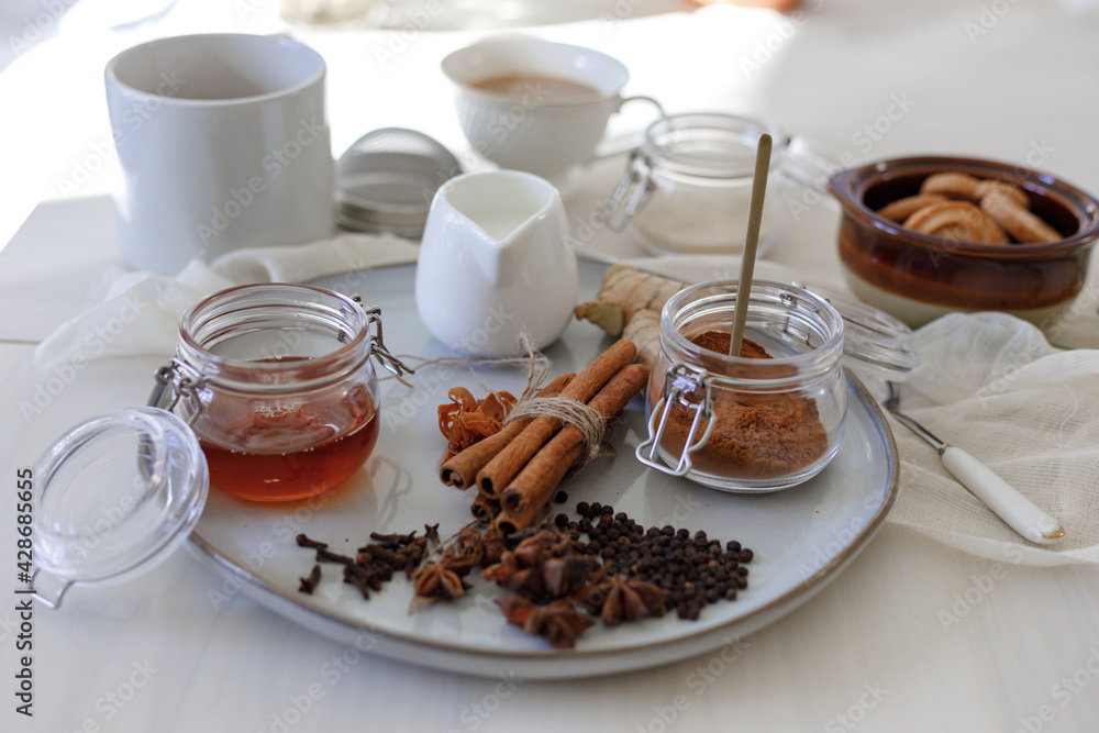 cup of indian tea and cinnamon cup of indian tea and cinnamon