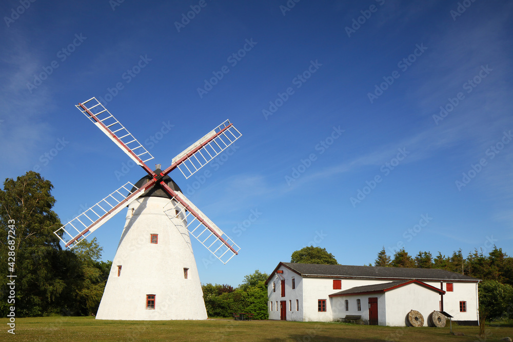 windmill with houses