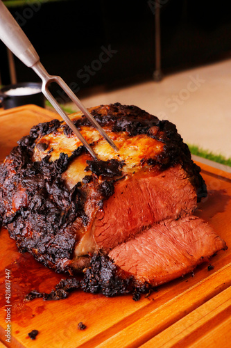 oven roasted beef rib eye steak on a carvery station