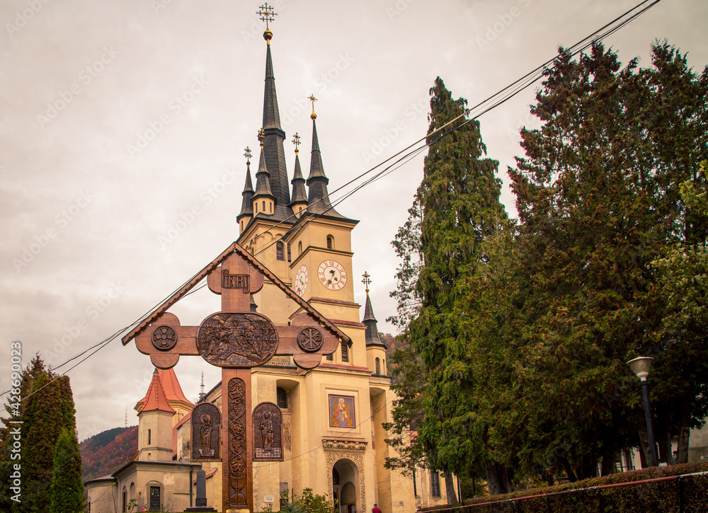 Obraz premium Orthodox wooden cross and Church