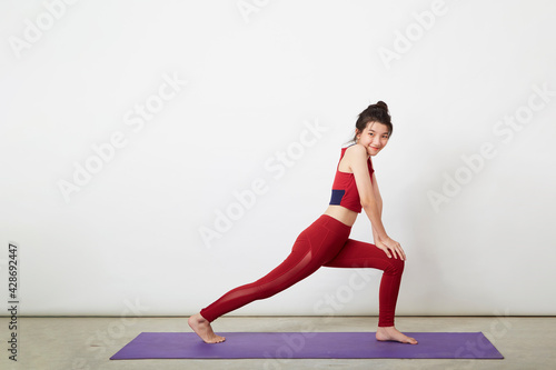 Fototapeta Naklejka Na Ścianę i Meble -  fitness Yoga woman warm up exercise position