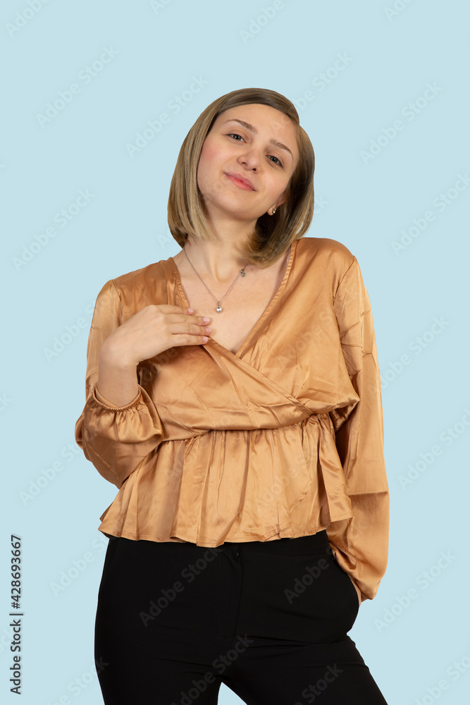 Young blonde showing signs with hands looking into camera Young blonde showing signs with hands looking into camera
